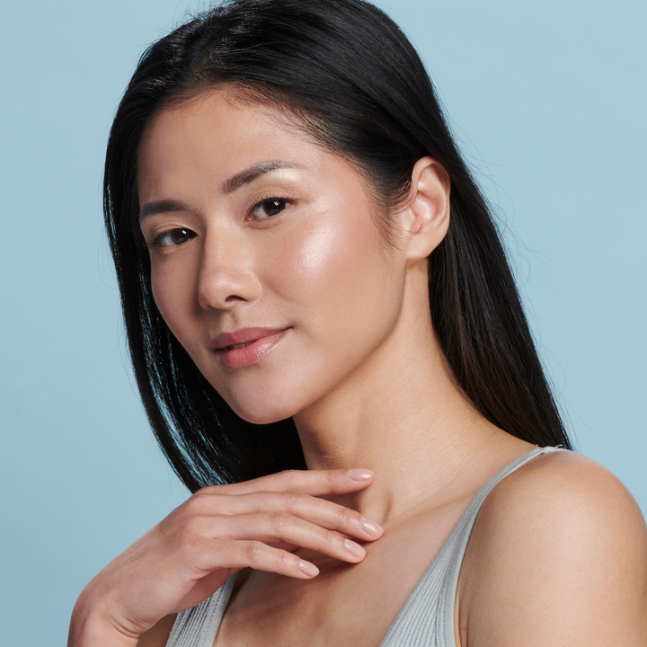 Woman  wearing Sunforgettable® Total Protection™ Face Shield Glow SPF 50 || all